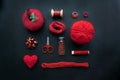 Red Sewing kit accessories and equipment for sewing and Needlework. Various tools for needlework: pin cushion for needles, thread Royalty Free Stock Photo