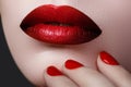Red Lips and Nails closeup. Open Mouth. Manicure and Makeup Royalty Free Stock Photo