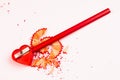 Red sharpener and pencil Royalty Free Stock Photo