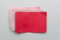 Red sheets of handmade paper on a light background. Paper recycling concept Royalty Free Stock Photo