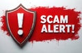 Red shield with white exclamation mark warns. SCAM ALERT text on red paint splash background highlights digital threats. Image Royalty Free Stock Photo