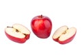 Red shiny apples whole apple and cut in halves on white background Royalty Free Stock Photo