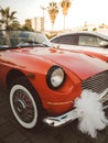 Red shiny classic wedding car Royalty Free Stock Photo