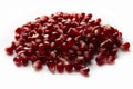 Red shiny pomegranate seeds on white background tasty and organic fruit peeled