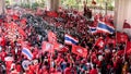 Red shirt protesters besiege riot army. Royalty Free Stock Photo