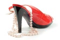 Red shoe with jewelry Royalty Free Stock Photo