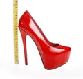 Red shoe and tape measure Royalty Free Stock Photo