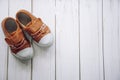 Red shoes for children on wooden floor Royalty Free Stock Photo