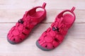 Red shoes sandle on a wooden background