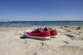 Red shoes, sandy beach Royalty Free Stock Photo