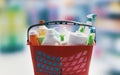 Red shopping basket with cleaning products Royalty Free Stock Photo