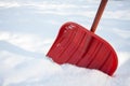 Red shovel for snow Royalty Free Stock Photo