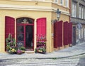Red shutters of flora shop cityscape of Prague