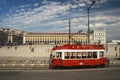 Red sightseeing tram at Lisbon Commerce square Royalty Free Stock Photo