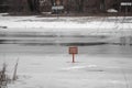 Red sign dangerously thin ice without inscription Snowtime danger red Royalty Free Stock Photo