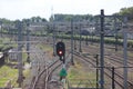 Red signals, tracks and switches on a railway yard in Rotterdam in the Netherlands