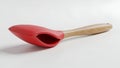 Red silicone spoon on white background Royalty Free Stock Photo