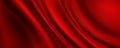 Red silk cloth background, luxury fabric texture