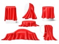 Red silk cloth covered objects. Realistic textile draperies, fabrics with folds on pedestals and frames, hidden surprise