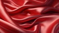 Red silk satin fabric texture background with sweeping ripples and folds. Royalty Free Stock Photo