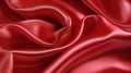 Red silk satin fabric texture background with sweeping ripples and folds. Royalty Free Stock Photo
