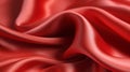 Red silk satin fabric texture background with sweeping ripples and folds. Royalty Free Stock Photo