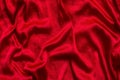 Red silk wavy fabric background texture