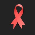 Red silky ribbon for HIV awareness day in December on black background. Vector illustration.