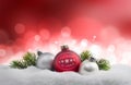 Merry Christmas balls and fir twigs in the snow Royalty Free Stock Photo