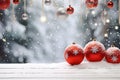 Red and silver Christmas balls hanging and standing on snowy surface. Royalty Free Stock Photo