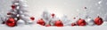 Red and silver Christmas balls in a row with white trees covered with snow. Royalty Free Stock Photo