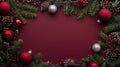 Red and silver ornaments surrounded by frosted pine branches on a deep red background Royalty Free Stock Photo