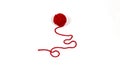 Red skein of thread against white background. Red ball of wool red thread isolated on white Royalty Free Stock Photo