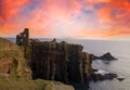 Red Skies over ruins of Bucholie Castle,Caithess.Scotland,UK