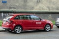 Red Skoda Rapid Spaceback NH1 of Sharp company parked on a street Royalty Free Stock Photo