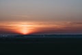 Red sky after the sunset over the fields, English countryside Royalty Free Stock Photo