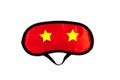 Red sleep mask on a white background. The concept of healthy sound sleep