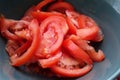 Red sliced tomatoes in a salad bowl. Royalty Free Stock Photo