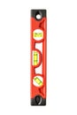 Red small bubble spirit level, isolated on a white. Building construction tool Royalty Free Stock Photo