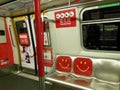 Red Smiley Faces on Subway Seats