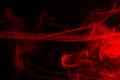 Red smoke abstract on black background, fire design and darkness concept Royalty Free Stock Photo