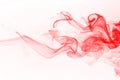 Red smoke abstract on white background, movement of red ink color Royalty Free Stock Photo