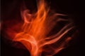 Red smoke on black background, darkness concept Royalty Free Stock Photo