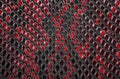 Red snake skin background Royalty Free Stock Photo