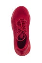 Red sneaker made of fabric on a white background Royalty Free Stock Photo