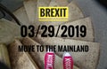 Red sneakers on spiral staircase when going downhill with inscription in english Brexit and 03/29/2019 and move to the mainland, i