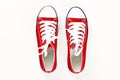 Red sneakers top view close up isolated on white background Royalty Free Stock Photo