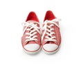 Red sneakers on a white background. Youth shoes