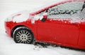 Red snow covered car Royalty Free Stock Photo