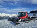 Red snowcat on the mountains Royalty Free Stock Photo